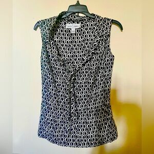 Sara Cambell Black and white blouse. Worn twice. Has been dry cleaned! Size 2.